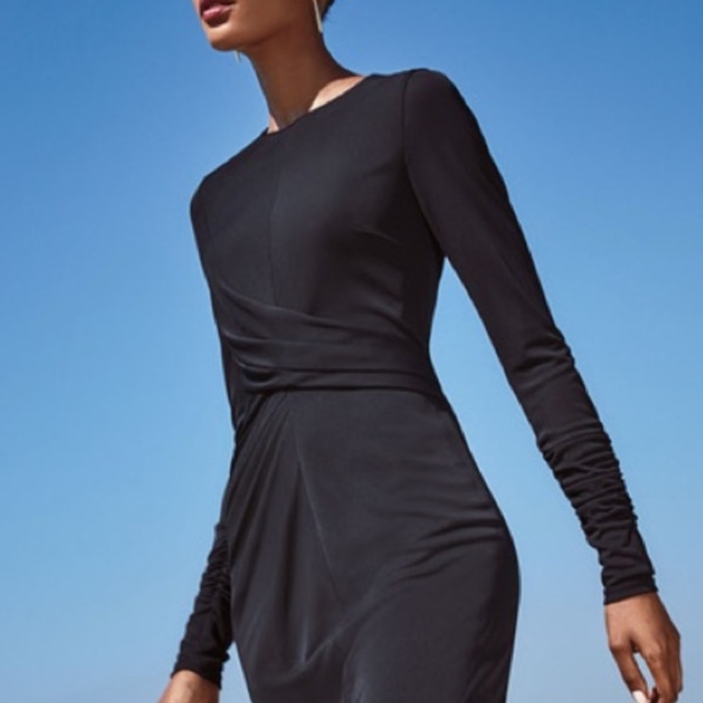 Draped jersey design with elegant long sleeves for a timeless look.